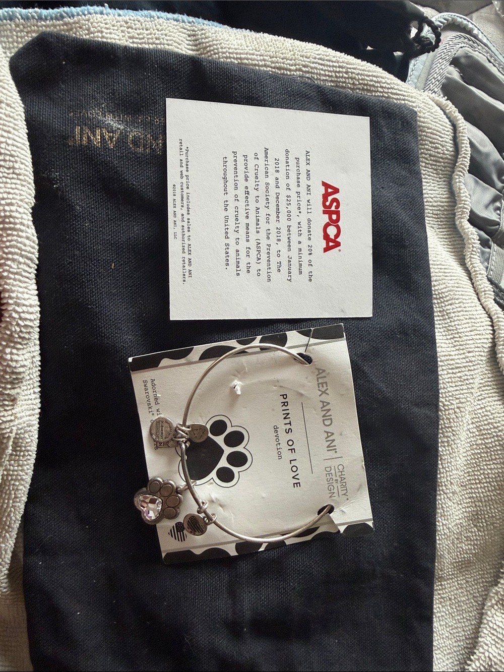 Alex and Ani Silver Paw Print Multi-Charm Bangle with Clear Accent